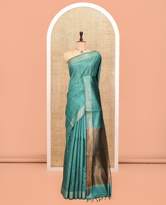 Green Plain Tussar Silk Saree, a Subtle Border, Gleaming Pallu, and a Matching Blouse