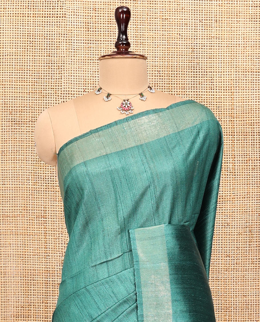 Green Plain Tussar Silk Saree, a Subtle Border, Gleaming Pallu, and a Matching Blouse
