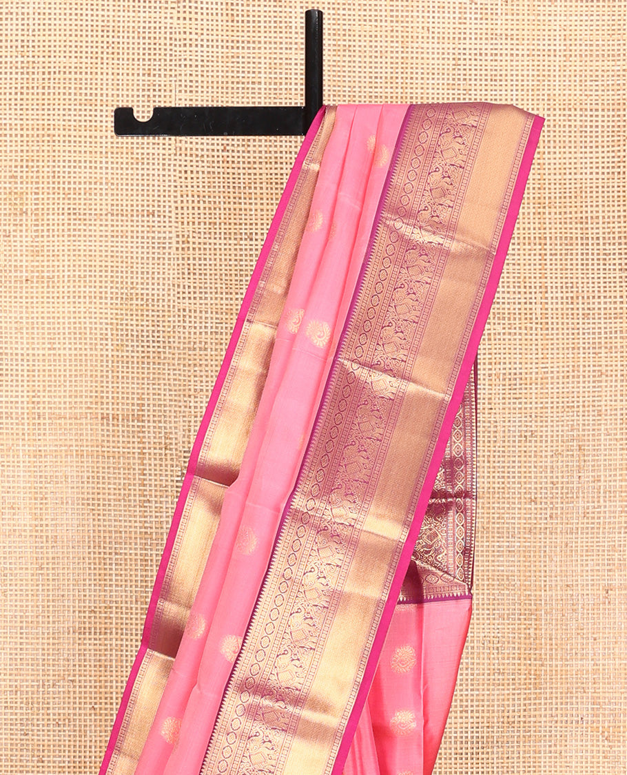 Pink Vasundhara Lite Silk Mix Saree, Mesmerized with Zari Buttas All Over Its Body, Complemented by Contrast Border of Rekku, Rudraksham, Laddu Kamalam, Yaanai, and Mayil Kann Designs, Grand Jaal Pallu and Paired with a Contrast Blouse