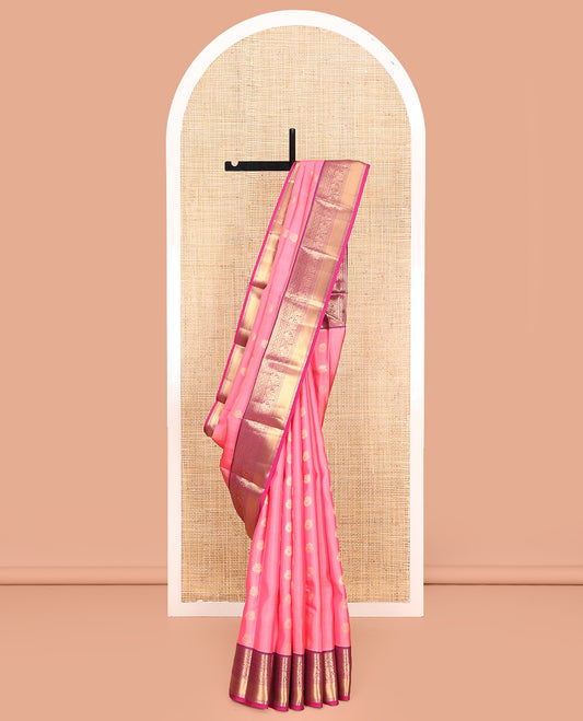Pink Vasundhara Lite Silk Mix Saree, Mesmerized with Zari Buttas All Over Its Body, Complemented by Contrast Border of Rekku, Rudraksham, Laddu Kamalam, Yaanai, and Mayil Kann Designs, Grand Jaal Pallu and Paired with a Contrast Blouse