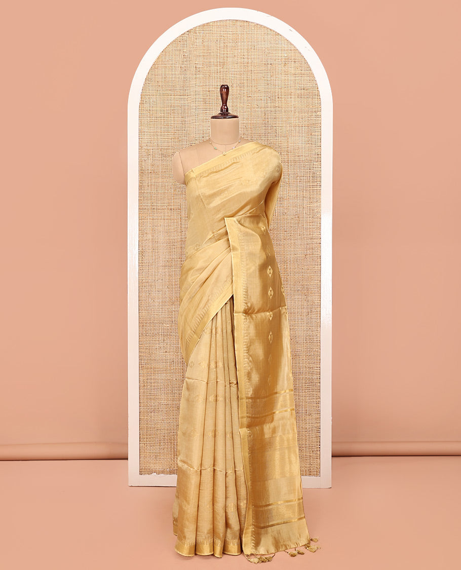 Sandal Banana Pith Saree, Subtly Sparkled with Buttas All Over Its Body, Subtle Border, Striped Pallu, and Paired with a Matching Blouse