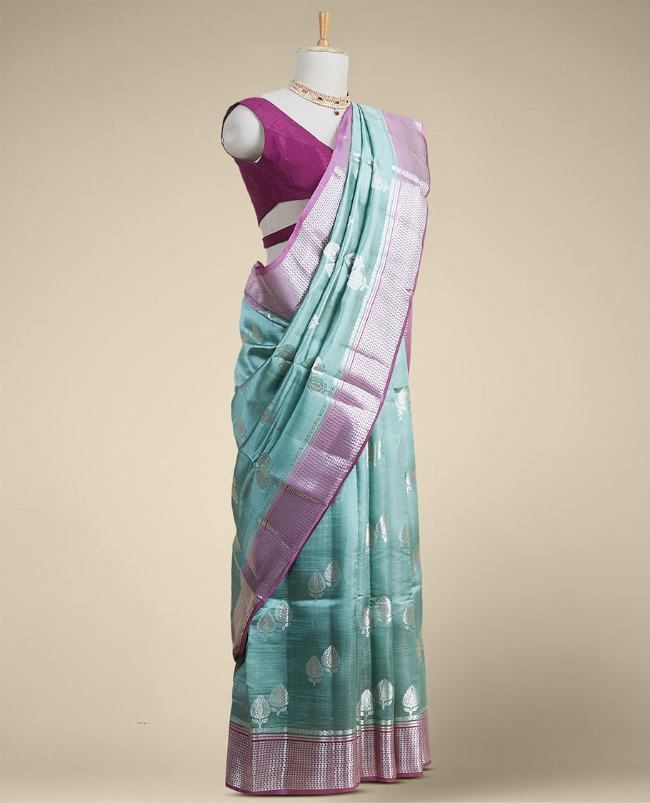 Green  floral motifs dupion silk saree with contrast intricate zari design border