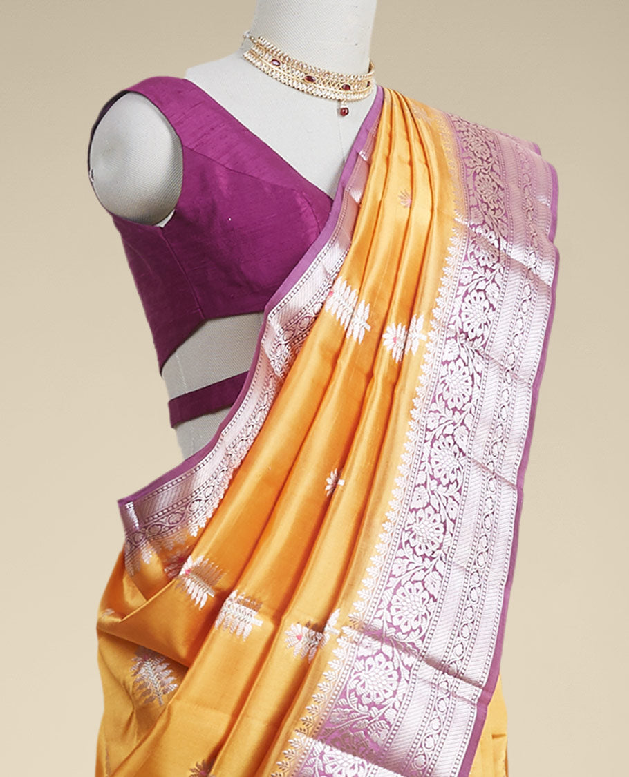 Yellow  floral motifs dupion silk saree with contrast intricate zari design border