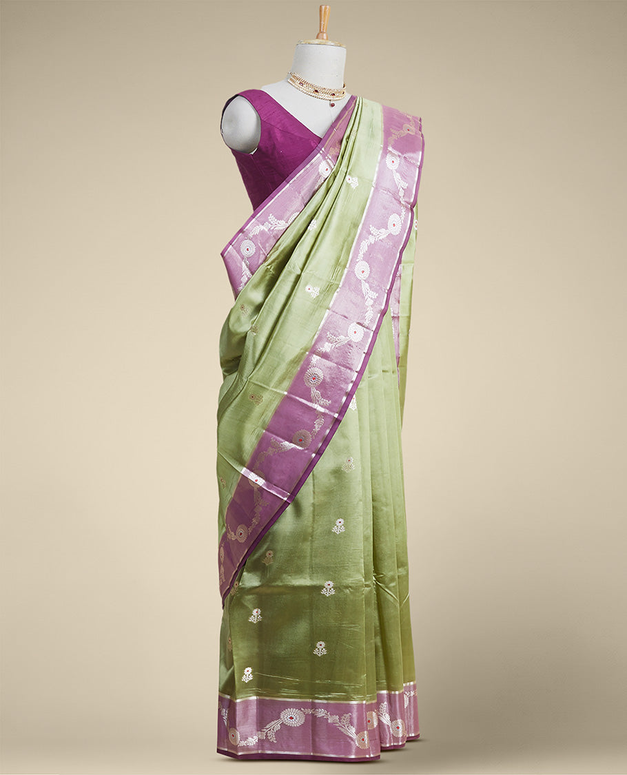 Green floral motifs dupion silk saree with contrast floral vine zari border