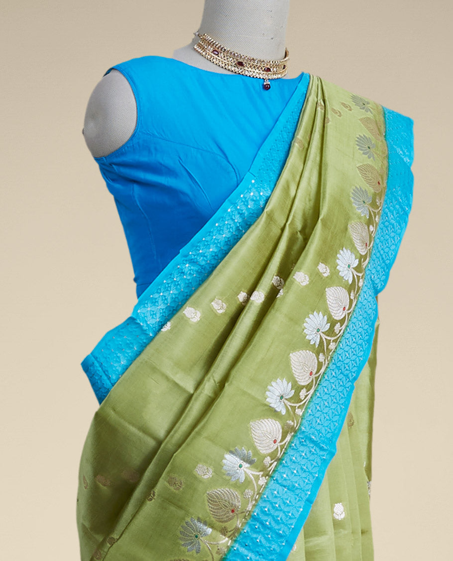 Green floral motifs dupio silk saree with contrast floral embroidery border