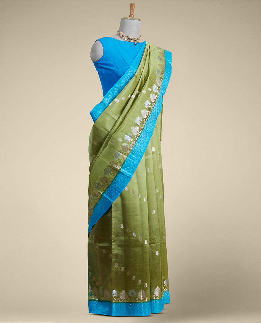 Green floral motifs dupio silk saree with contrast floral embroidery border