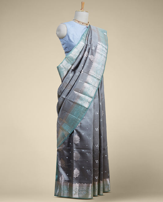 Gery floral motifs dupion silk saree with contrast intricate zari border