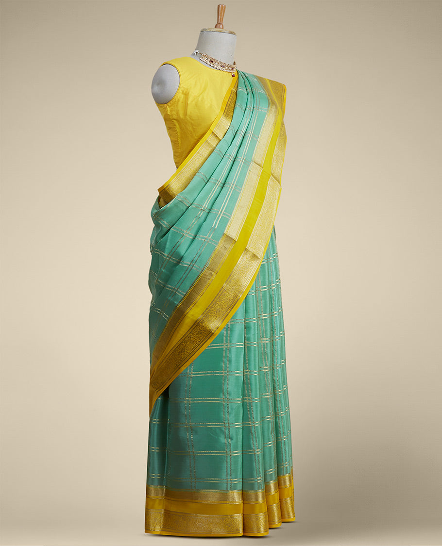 Green checked mysore silk saree with contrast intricate zari border