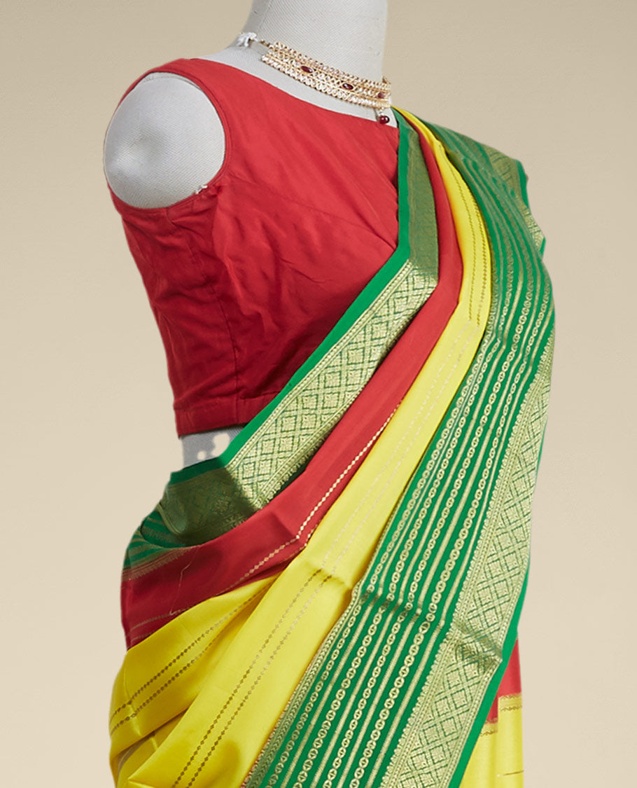Yellow striped design mysore silk sare with contrast traditional zari border