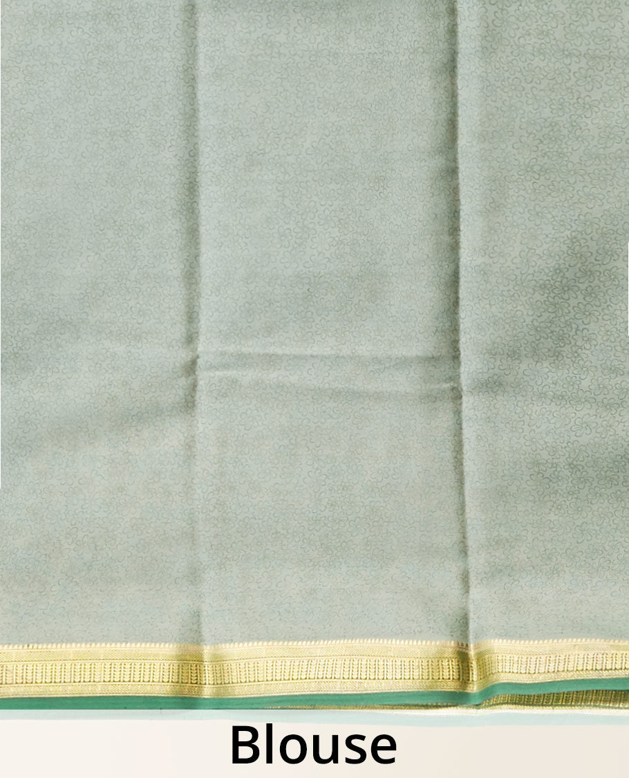 Green floral printed silk saree with contrast zari border