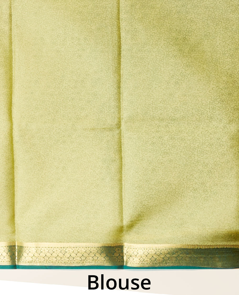 Green floral printed silk saree with contrast zari border