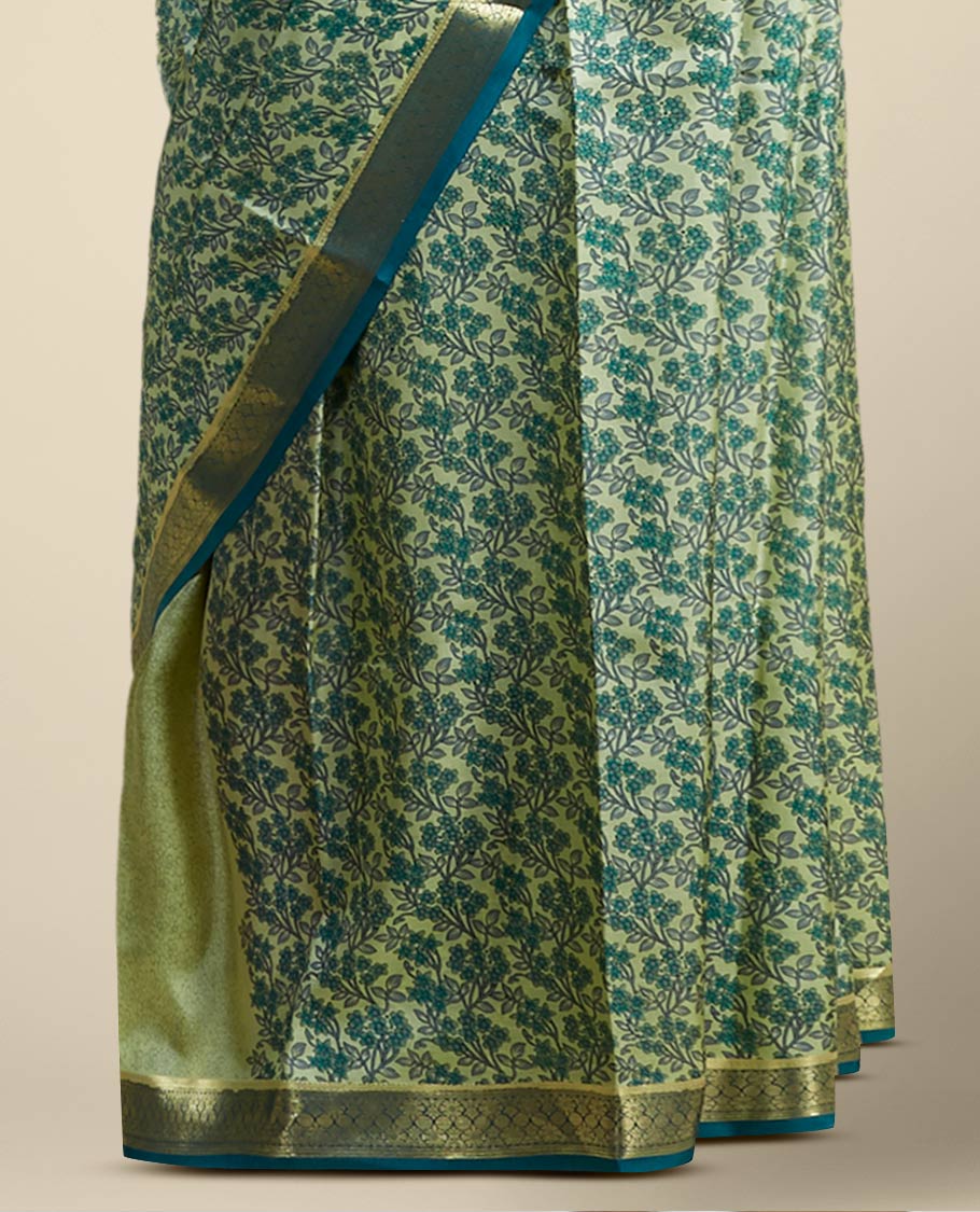 Green floral printed silk saree with contrast zari border
