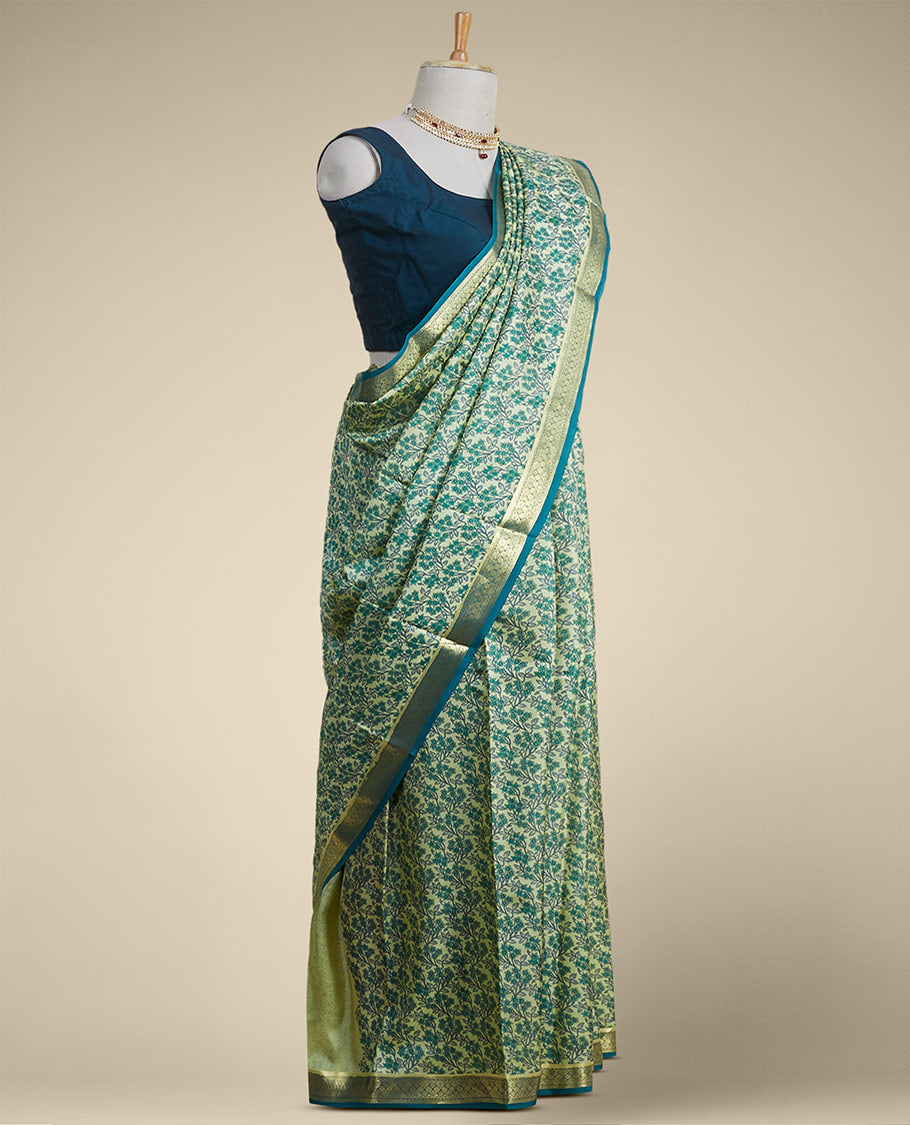 Green floral printed silk saree with contrast zari border