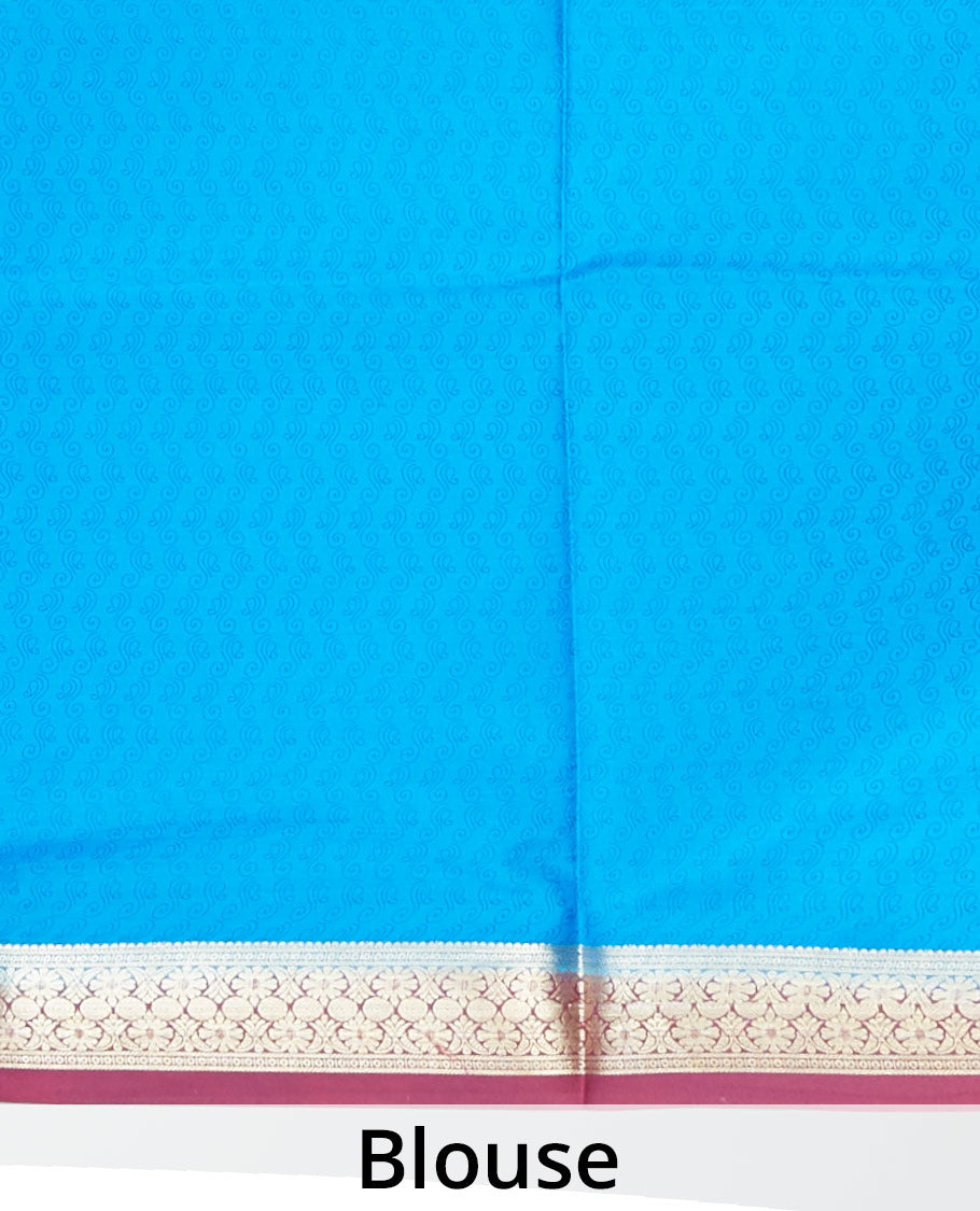 Blue floral printed silk saree with contrast intricate zari design border