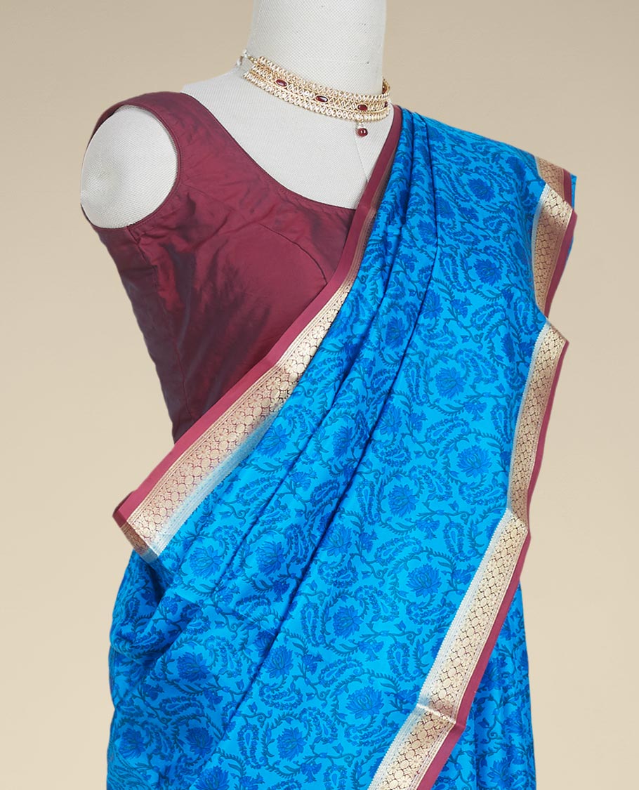 Blue floral printed silk saree with contrast intricate zari design border