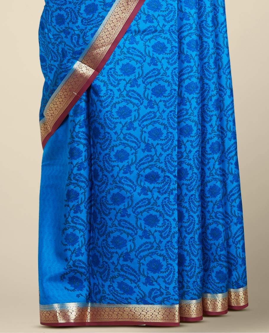 Blue floral printed silk saree with contrast intricate zari design border