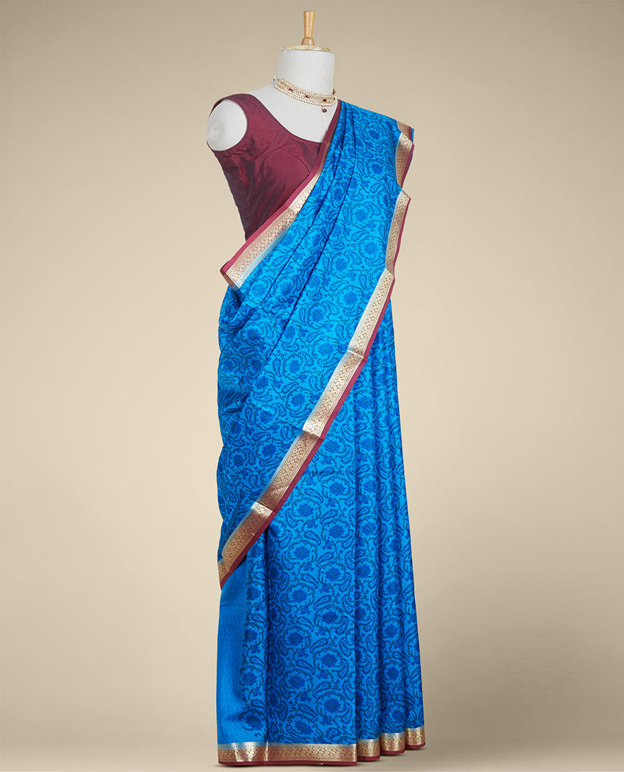 Blue floral printed silk saree with contrast intricate zari design border