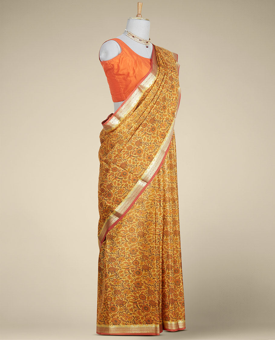 orange  floral printed silk saree with contrast intricate zari design border