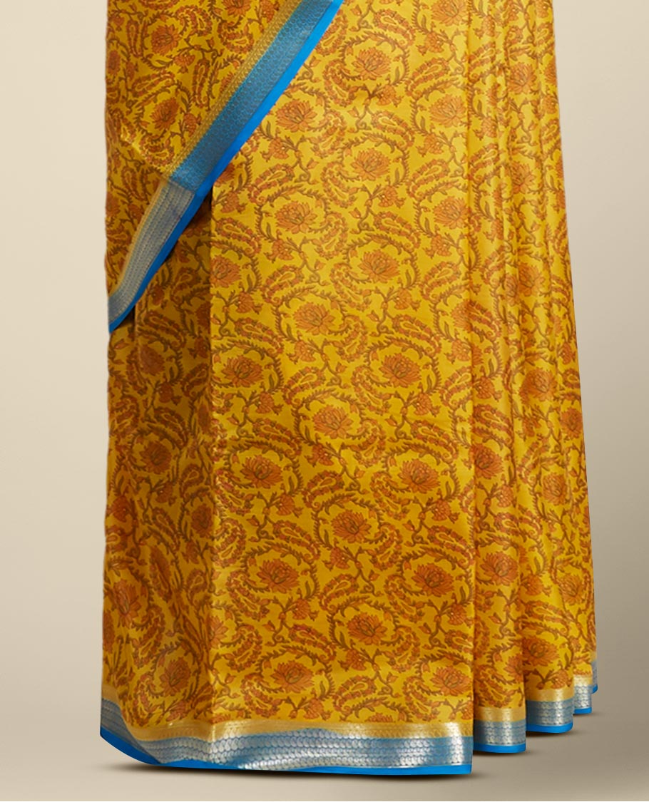 Yellow floral vine design printed silk saree with contrast striped zari border