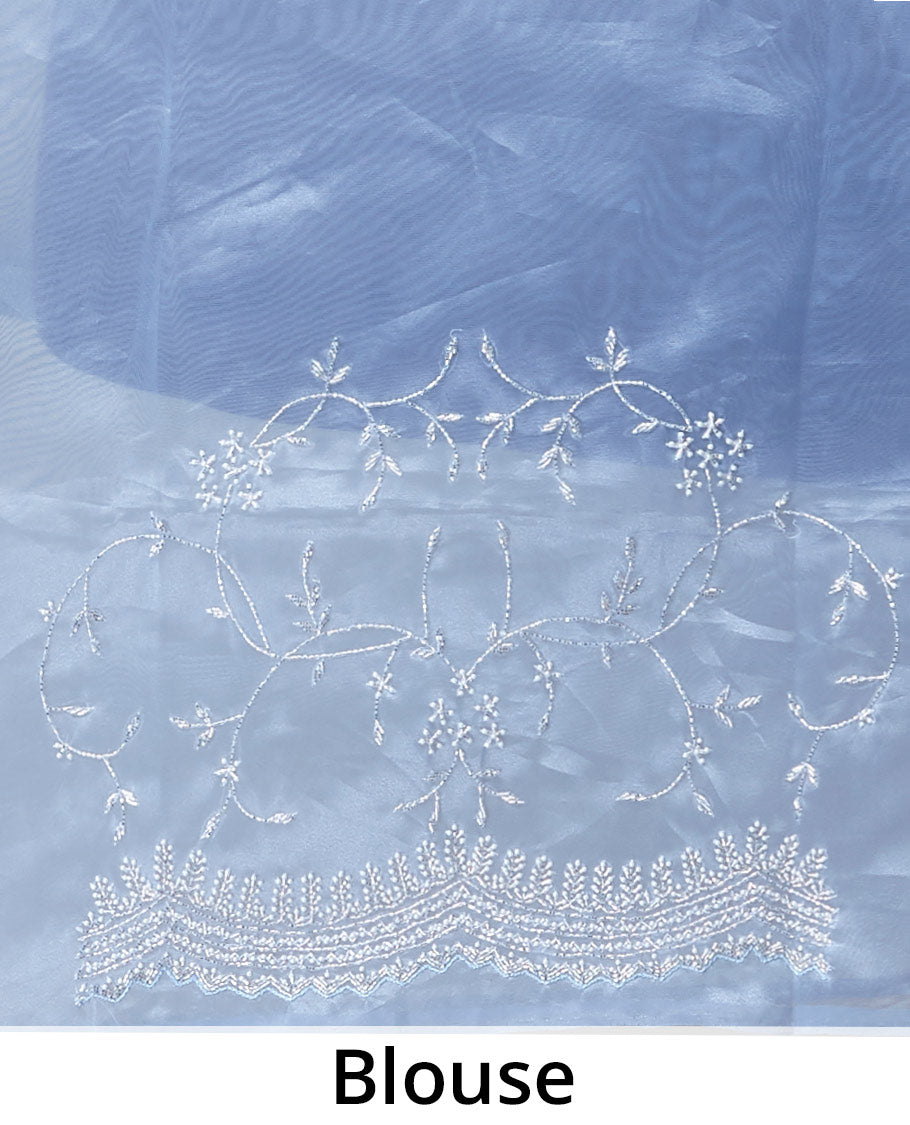 Blue floral emboridery tissue silk saree with scallop floral border