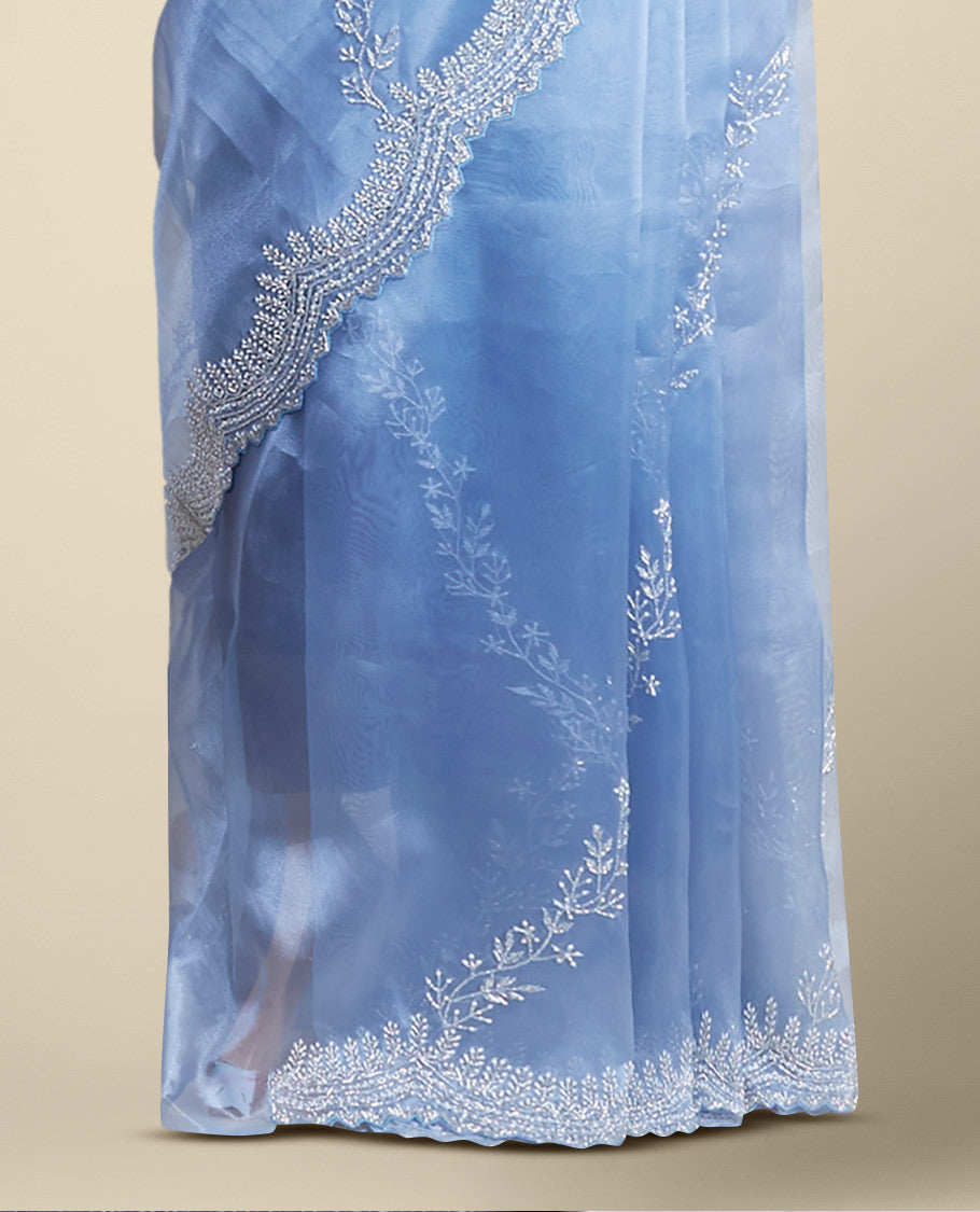 Blue floral emboridery tissue silk saree with scallop floral border