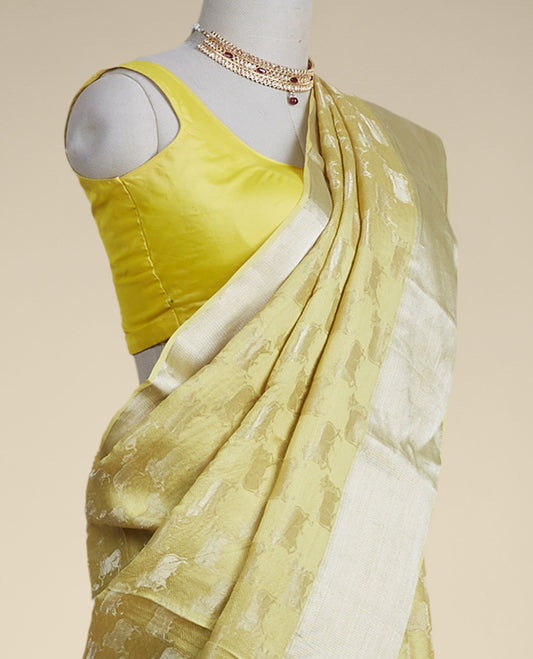 Yellow anial motifs pure crepe saree with self zari border