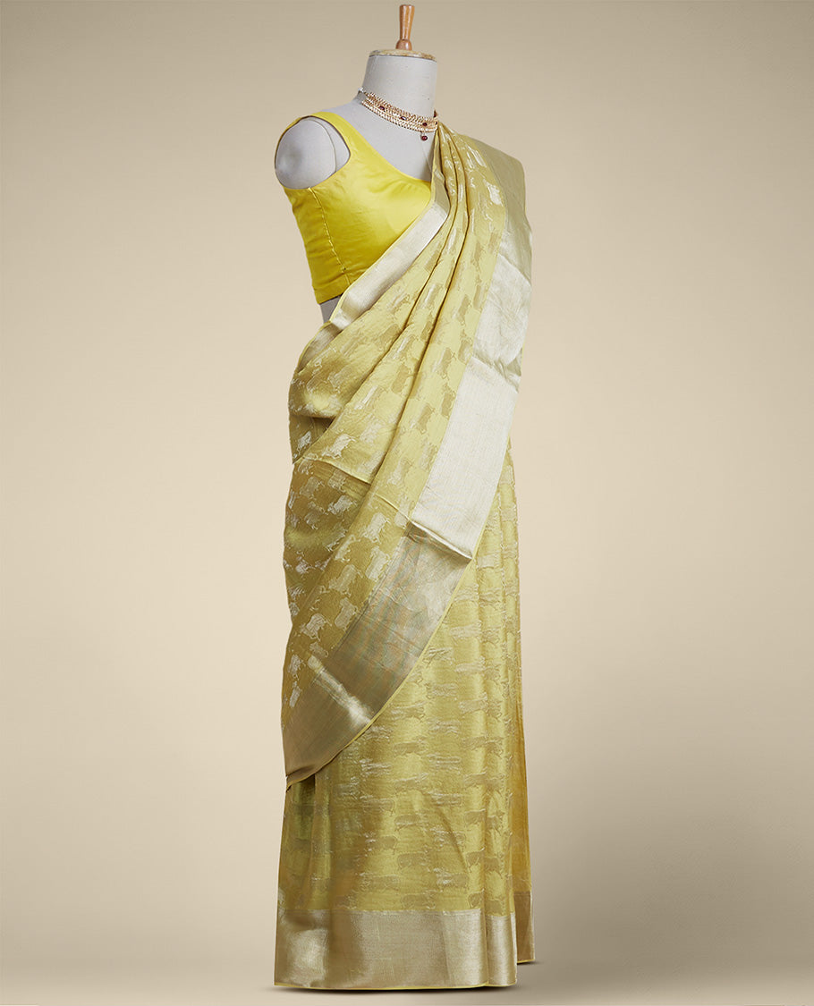 Yellow anial motifs pure crepe saree with self zari border