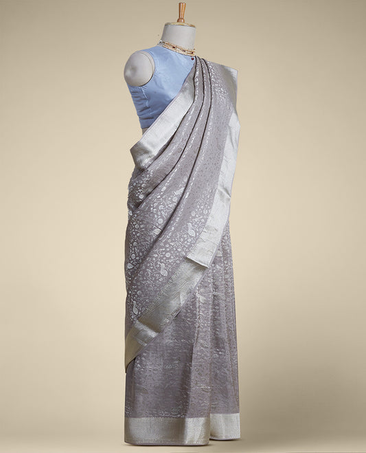 Grey floral design pure crepe saree with self zari border