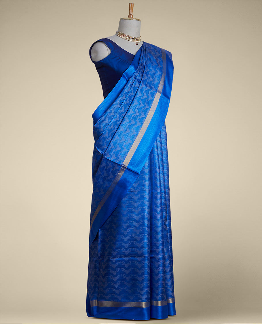 Blue intricate design tusser silk saree  with self zari border