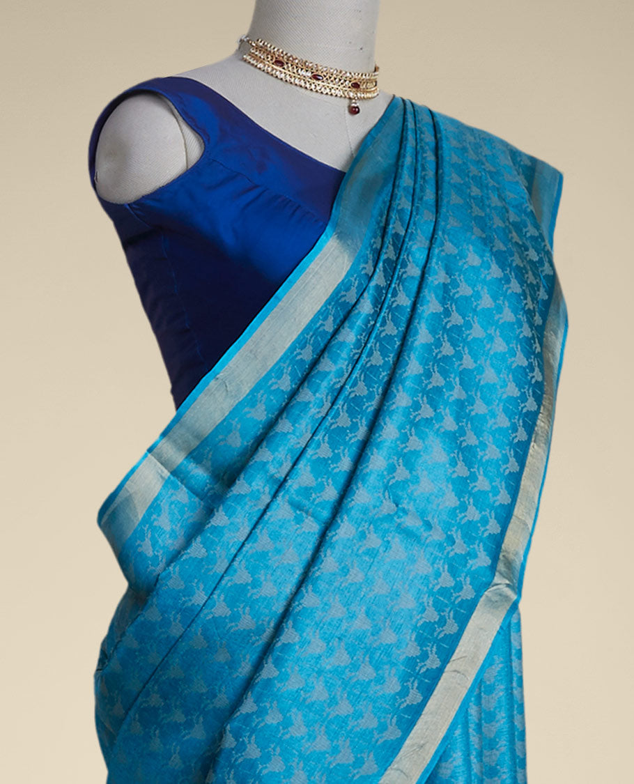 Blue intricate design tusser silk saree  with self zari border