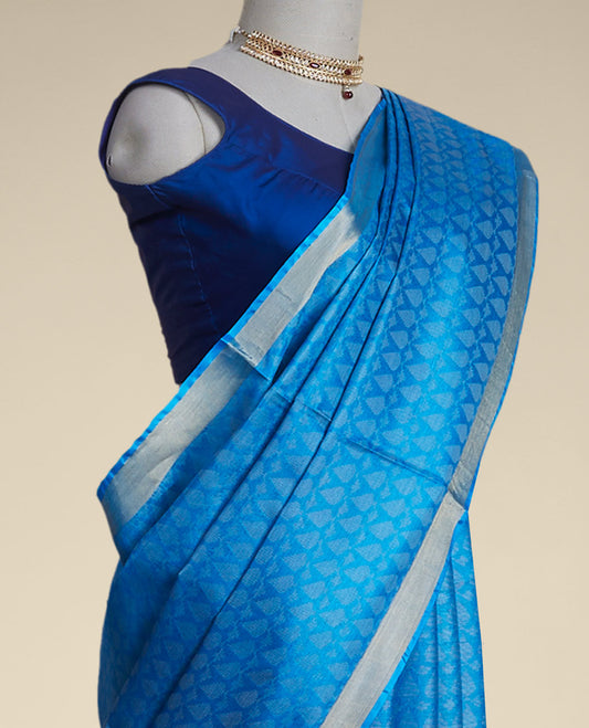 Blue leaf design tusser silk saree with self zari border