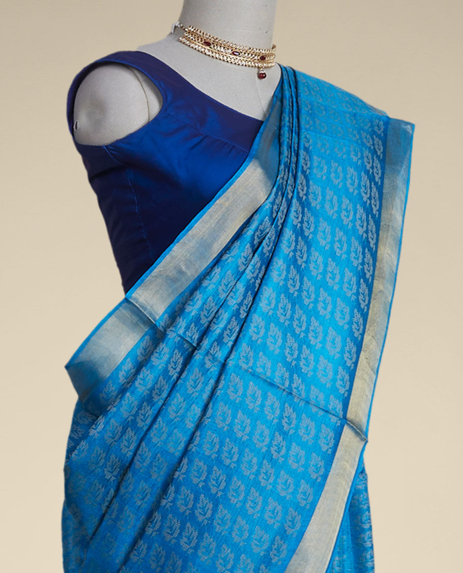 Blue leaf design tusser silk saree with self zari border