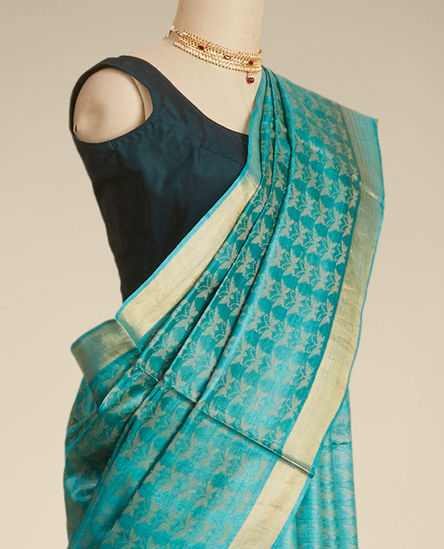 Green  intricate design  tusser silk saree with self zari border