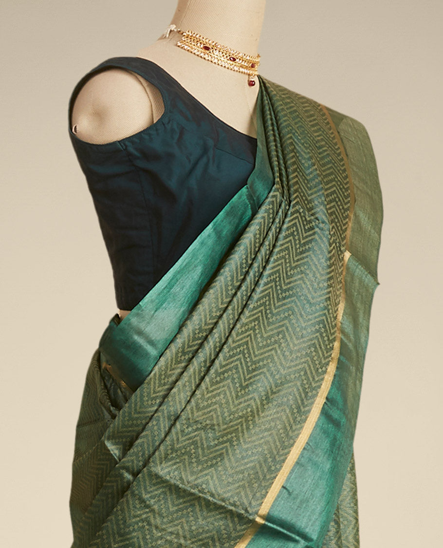Green zig- zag striped design tusser silk saree with contrast zari border