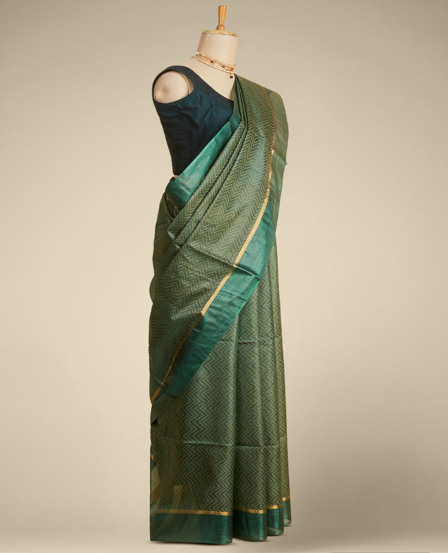 Green zig- zag striped design tusser silk saree with contrast zari border