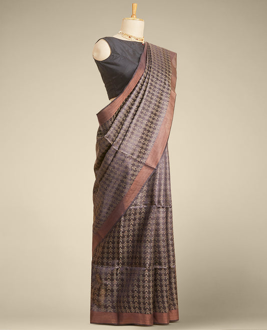 Brown floral design tusser silk saree with self zari border