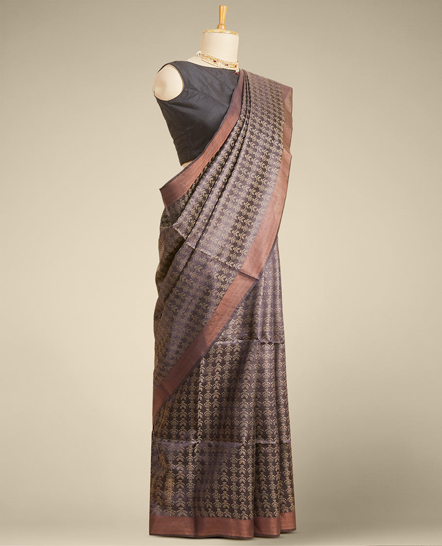 Brown floral design tusser silk saree with self zari border