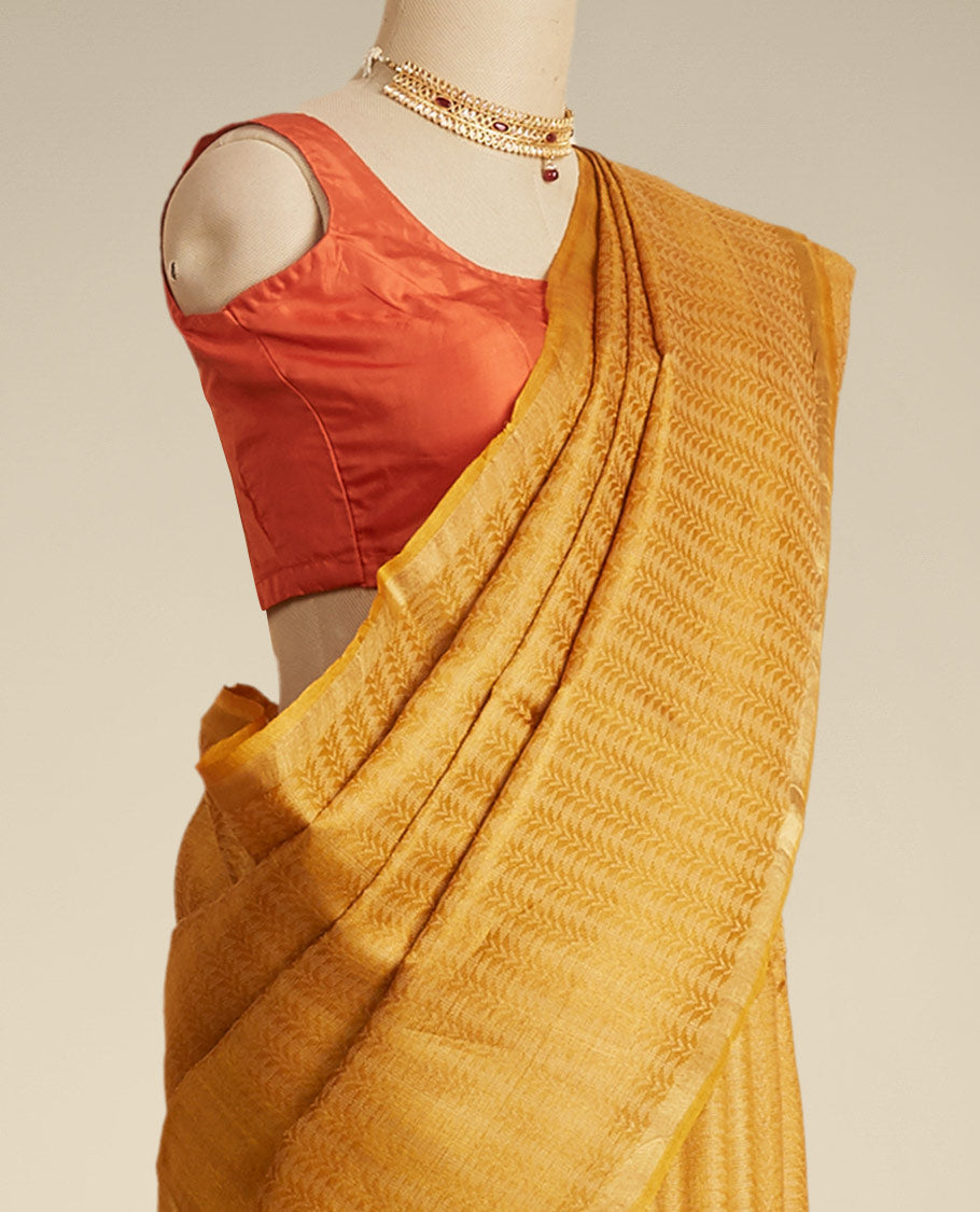 Yellow leaf vine design tusser silk saree with self zari border
