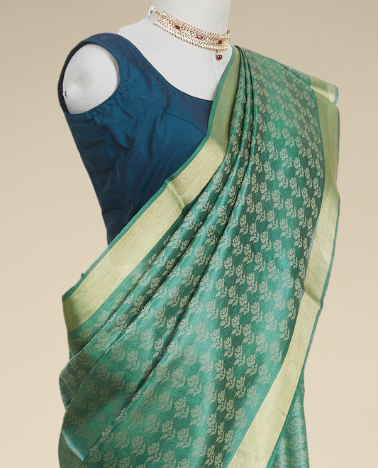 Green floral design tusser silk saree with self zari border