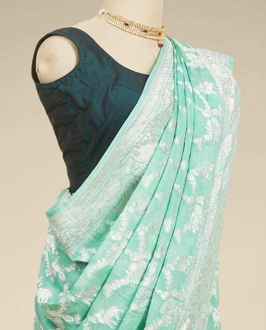 Green leaf motifs banaras georgette saree with traditional zari border