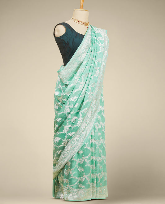 Green leaf motifs banaras georgette saree with traditional zari border