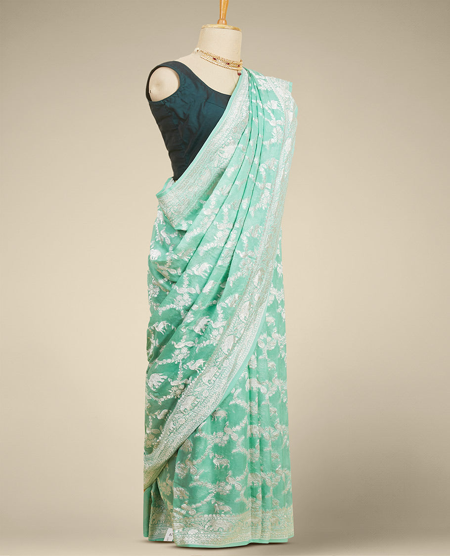 Green leaf motifs banaras georgette saree with traditional zari border
