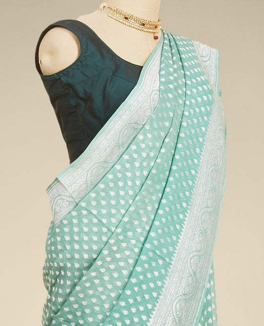 Green leaf motifs banaras georgette saree with traditional zari border