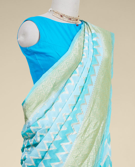Blue rangkat style banaras georgette saree with zig zag striped zari border