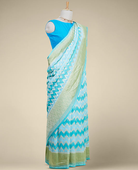 Blue rangkat style banaras georgette saree with zig zag striped zari border
