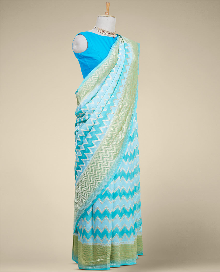 Blue rangkat style banaras georgette saree with zig zag striped zari border