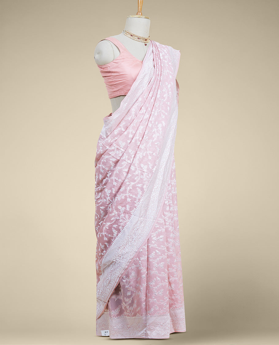 Pink floral vine design  banaras georgette saree with self inticate zari border