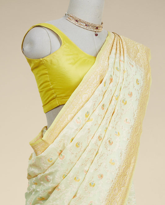 Yellow floral vine design  banaras georgette saree with contrast inticate zari border