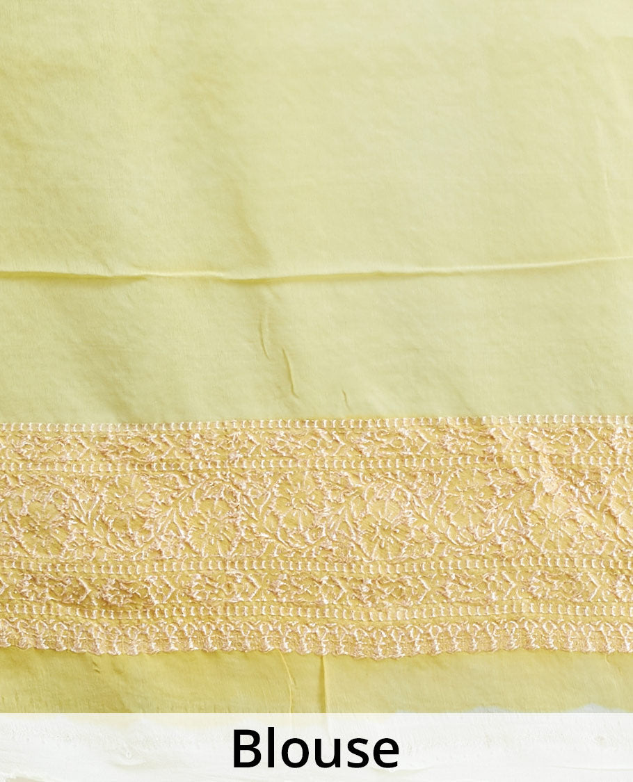 Yellow rangkat style banaras georgette saree with contrast floral zari border