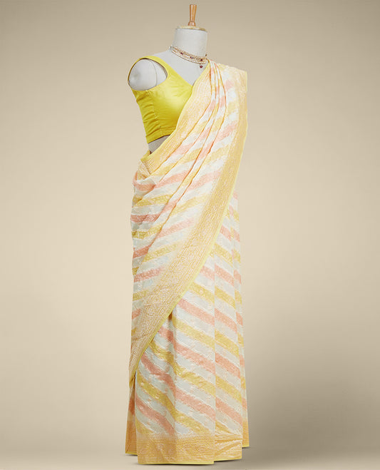 Yellow rangkat style banaras georgette saree with contrast floral zari border